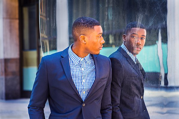 coach looking at his reflection in the chicago bean