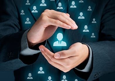 person in suit holding hands around a person icon with the hands surrounded by other people icons