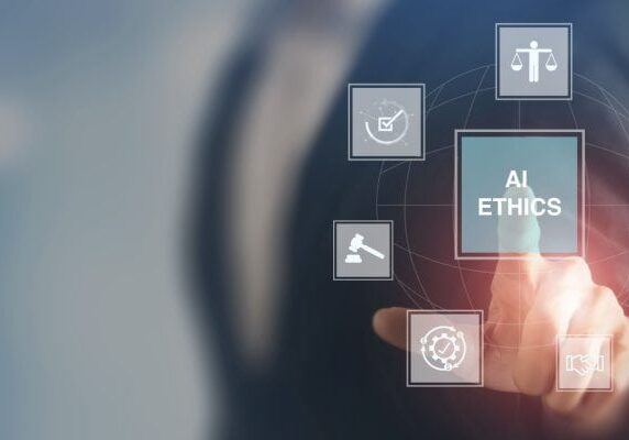 person pointing to transparent screen with icons and one stating AI Ethics