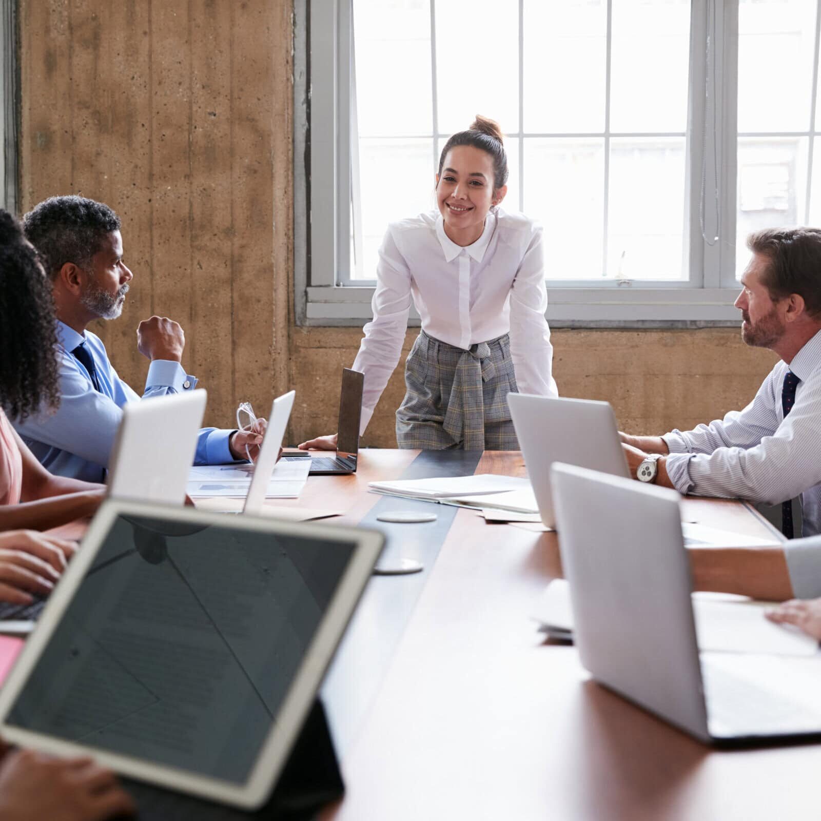 Businesswoman,Addressing,Colleagues,At,A,Meeting,,Close,Up