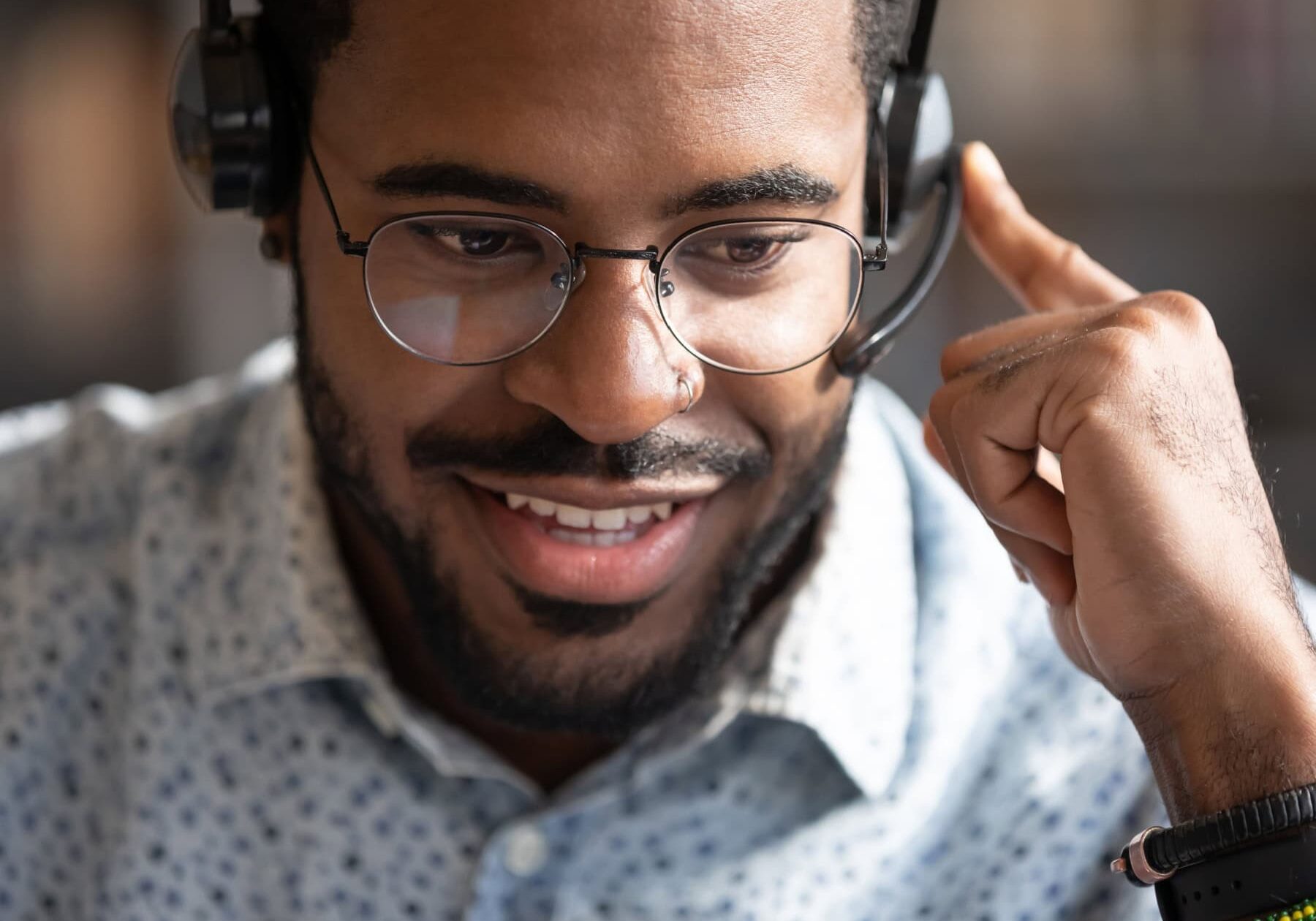 A man learns more about the ICF Exam Accommodations through Pearson VUE