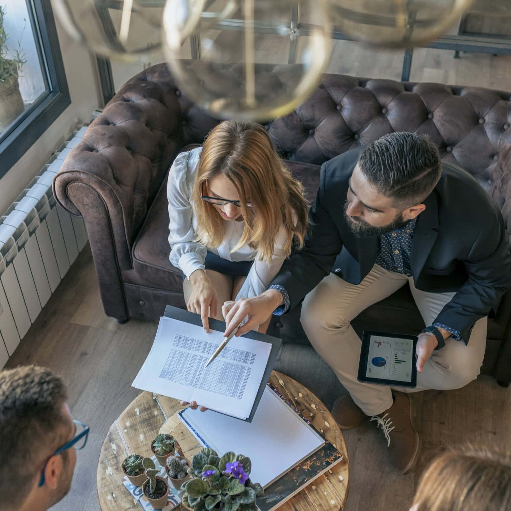 Student coaches collaborating on strategic planning and analysis.