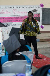 Catherine Wanjohi, ACC, CEO of Life Bloom Services at graduation ceremony