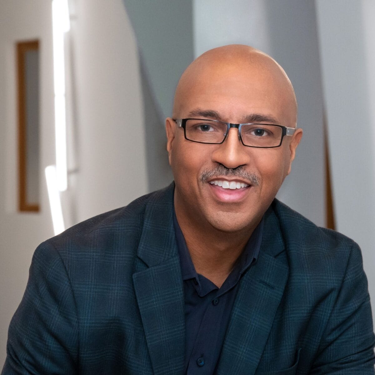 Headshot of Melvin Smith. Known for coaching with compassion and expertise in lifelong learning and growth.