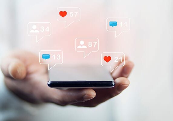 cellphone with chat bubbles and notification symbols